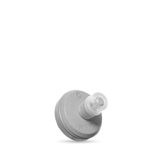 A 42mm HydraPak bite valve, grey with a translucent white plastic cap, shown on a clean white background.