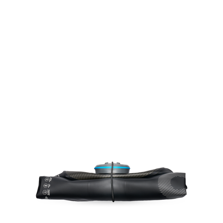 Side view of black HydraPak 8 litre expedition water storage bladder shown flattened with band holding it folded.