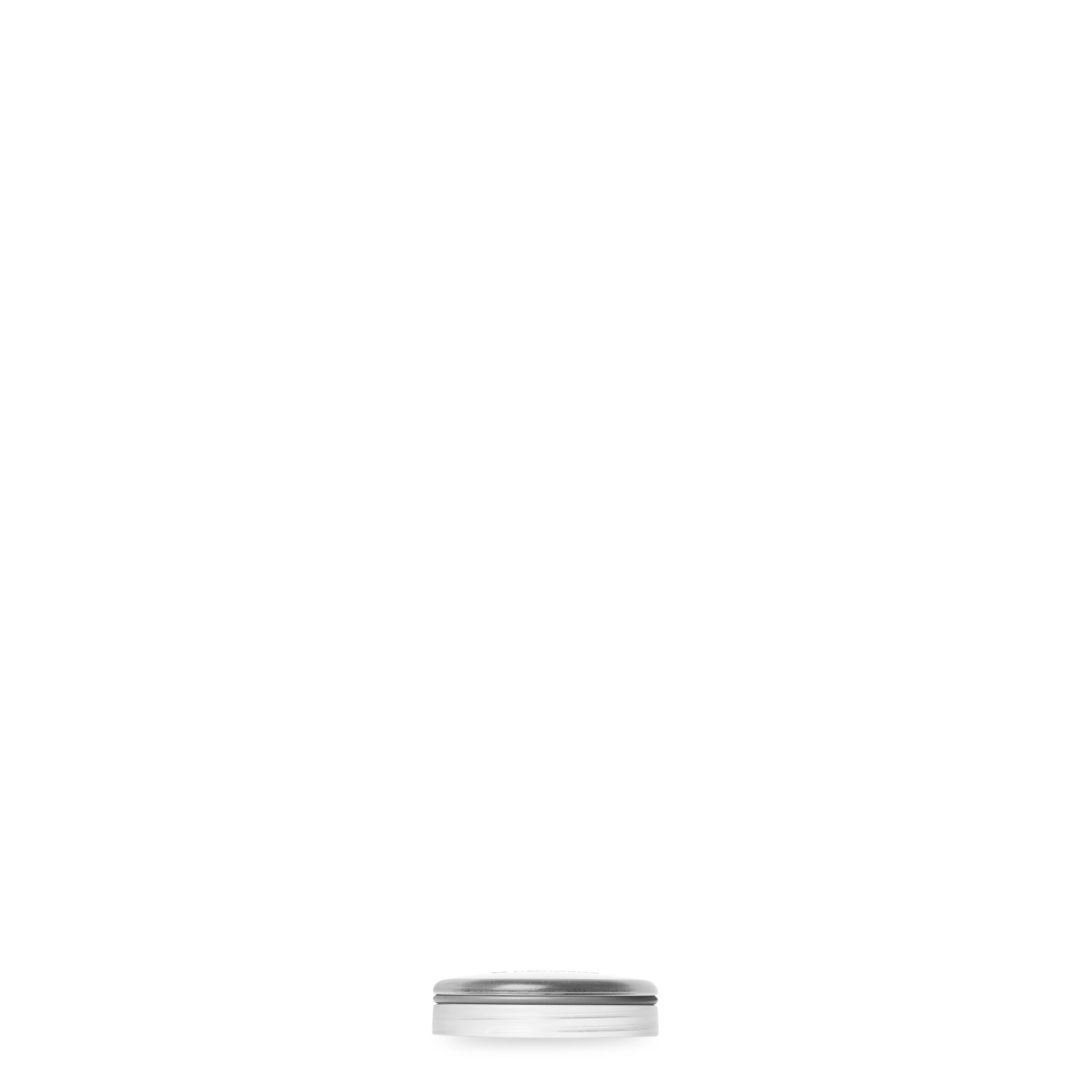 Side view of HydraPak Recon leakproof Flat Cap to convert 500 ml, 750 ml and 1 litre Recon bottles into a wide mouth bottle for water or dry food storage.  Colour: Clear. 